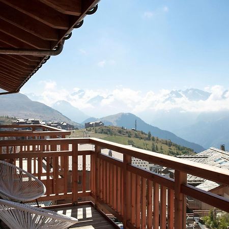 Grandes Rousses Hotel & Spa Alpe d'Huez Bagian luar foto A balcony in Les Saisies