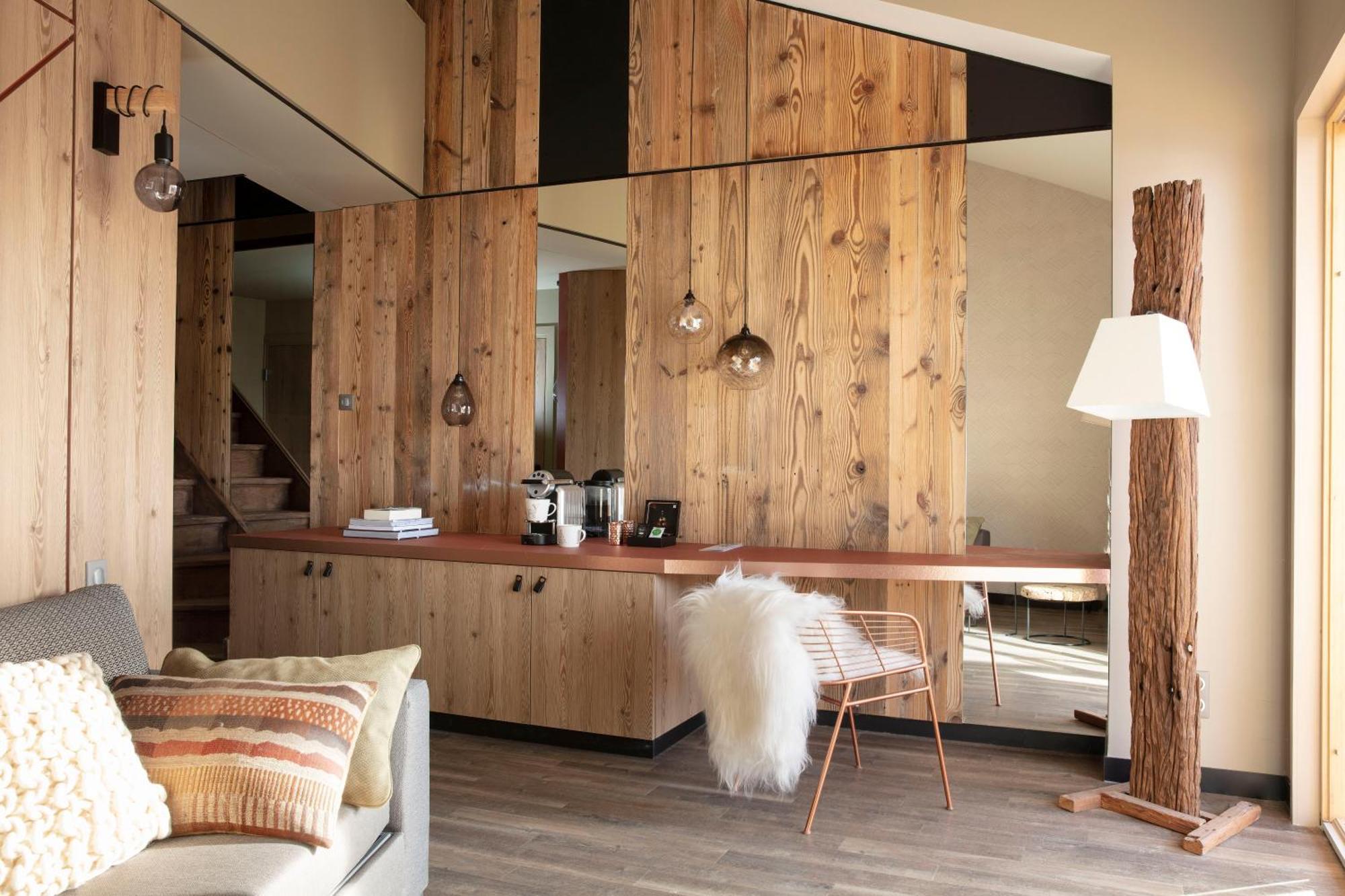 Grandes Rousses Hotel & Spa Alpe d'Huez Bagian luar foto Interior of a chalet